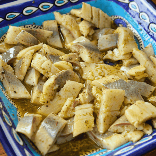 cymes śledziowy, zalanie olejem